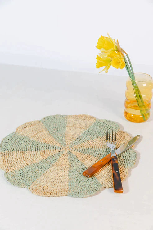 Blue Pinwheel Placemat from Payton James, decorative table top with vibrant pinwheel design for dining or entertaining.