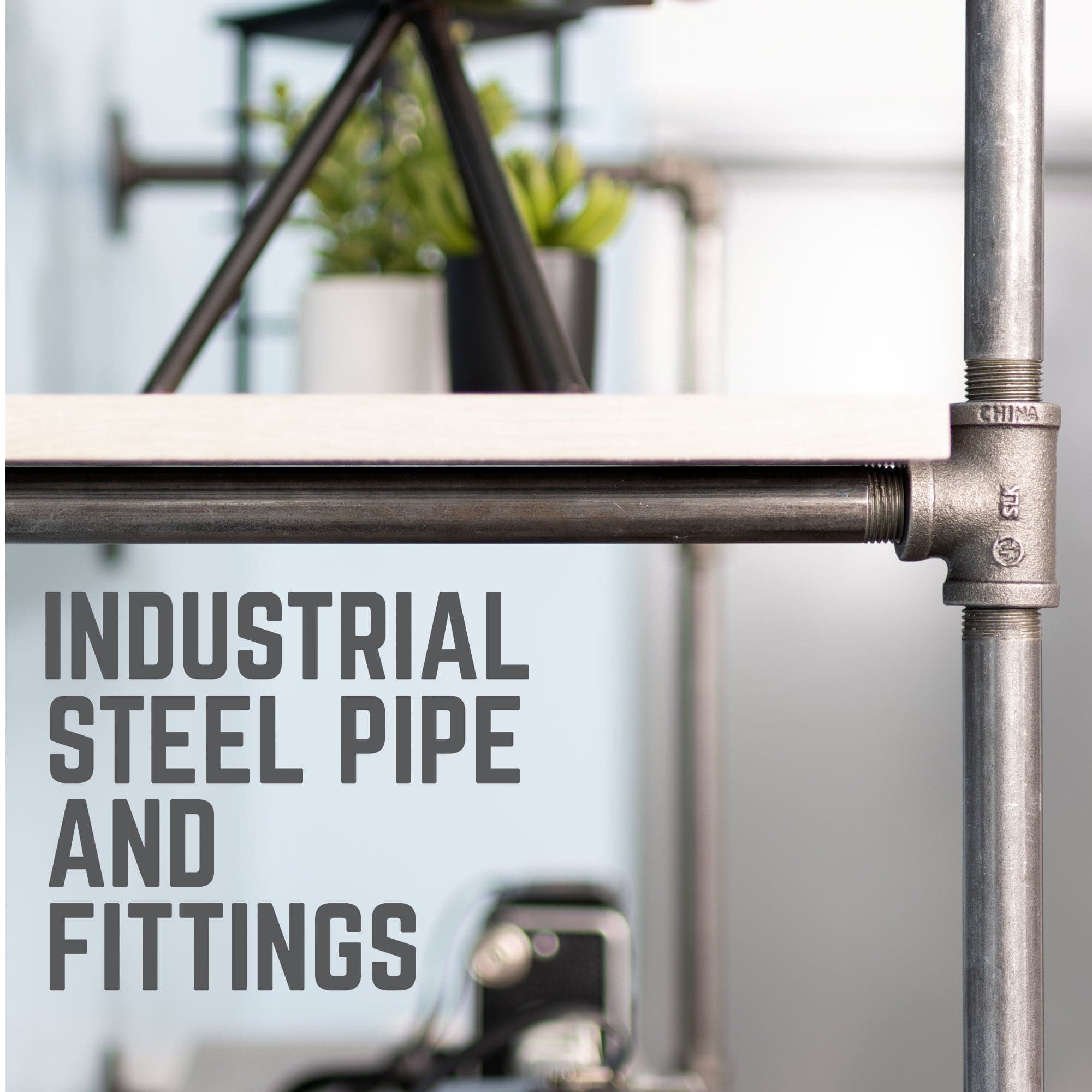 Two-tier wall-mounted shelf with black pipe decor brackets, showcasing industrial-style storage and display space.