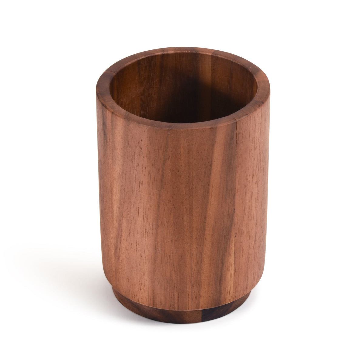 Kalmar Home rotating lazy Susan utensil holder on a tabletop, featuring multiple compartments for kitchen utensils.