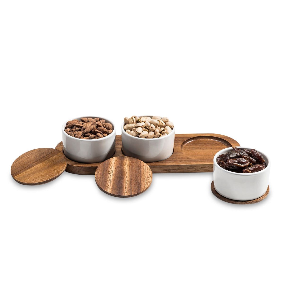 Ceramic condiment set with six small dishes on acacia wood serving tray, Kalmar Home ceramic serveware for condiments.