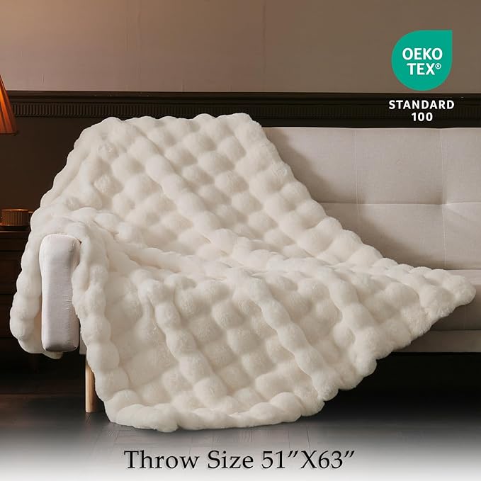 CozyNest Decor FUR Bubble Throw blanket with soft, plush texture and bubble design, perfect for cozying up on the couch.
