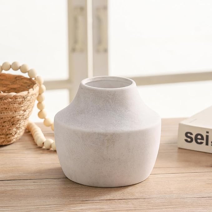 CozyNest Decor terracotta vases with a rustic finish and varied shapes, perfect for home decor or floral arrangements.