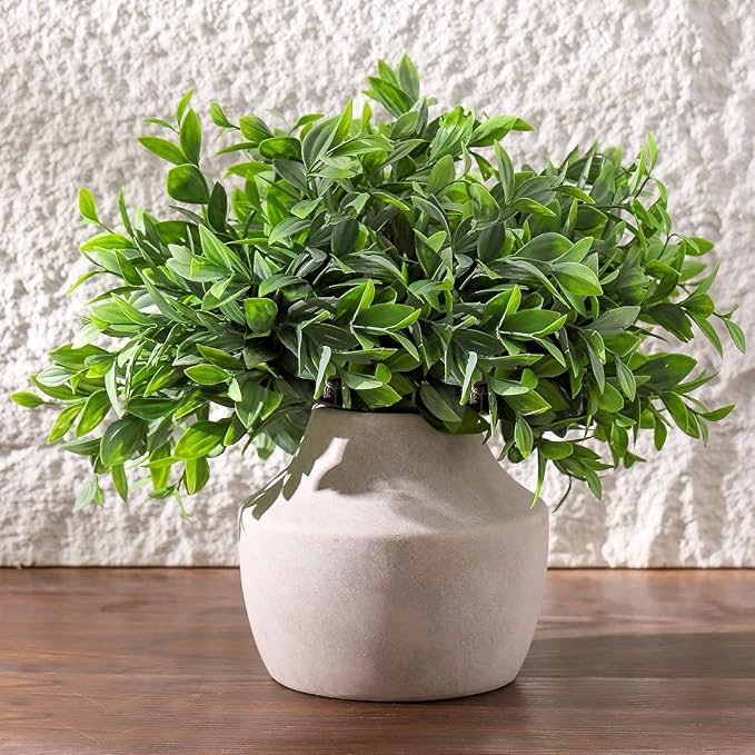 CozyNest Decor terracotta vases featuring a rustic, earthy finish and simple shape, perfect for home decor or floral arrangements.
