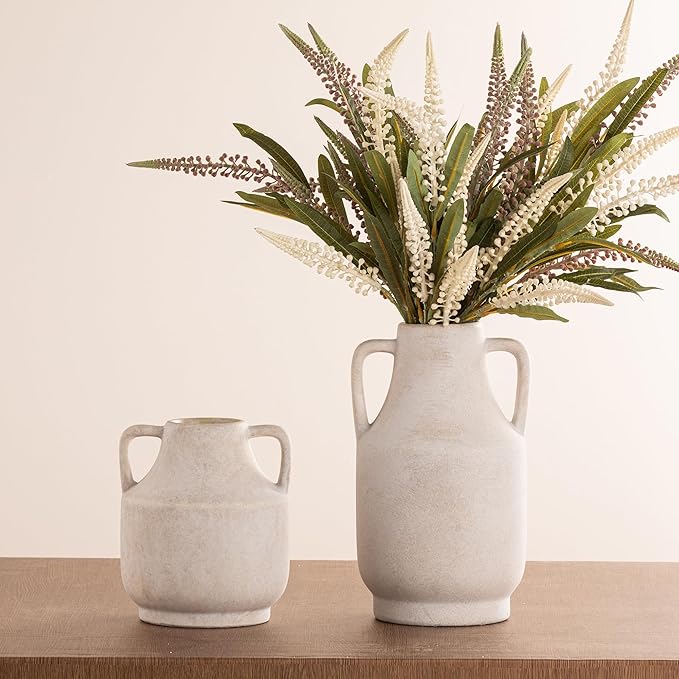 Rustic terracotta vase by CozyNest Decor featuring a handcrafted design with a textured surface and earthy finish.