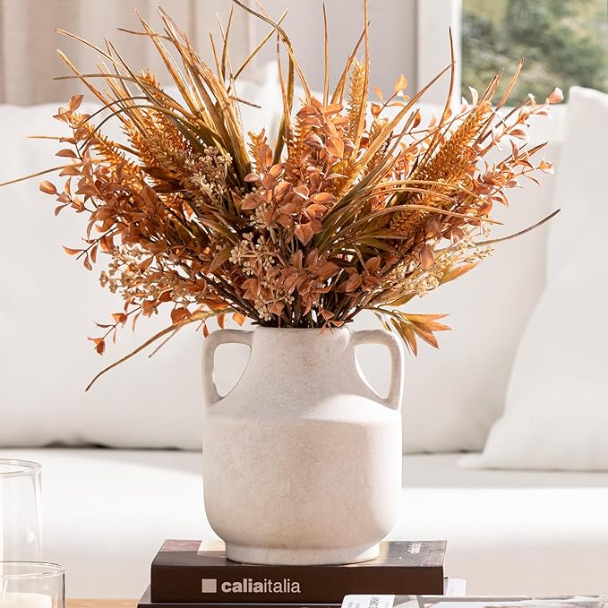 Rustic terracotta vase from CozyNest Decor with a natural, textured finish, perfect for rustic or bohemian decor styles.