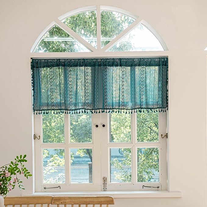 Turquoise crochet lace boho valance curtain with tassels, rustic farmhouse style, sheer knitted design, rod pocket, for kitchen window decor.