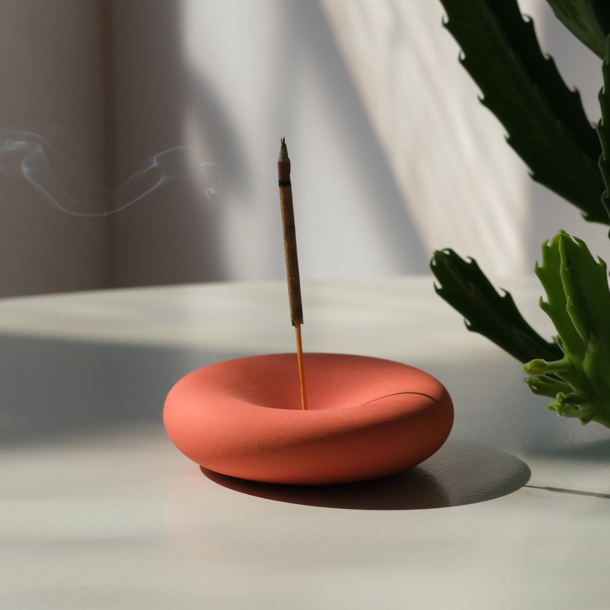 Eve Incense by Misewell in a square packaging, featuring blood orange scent, designed as a home accessory for aromatic ambiance.