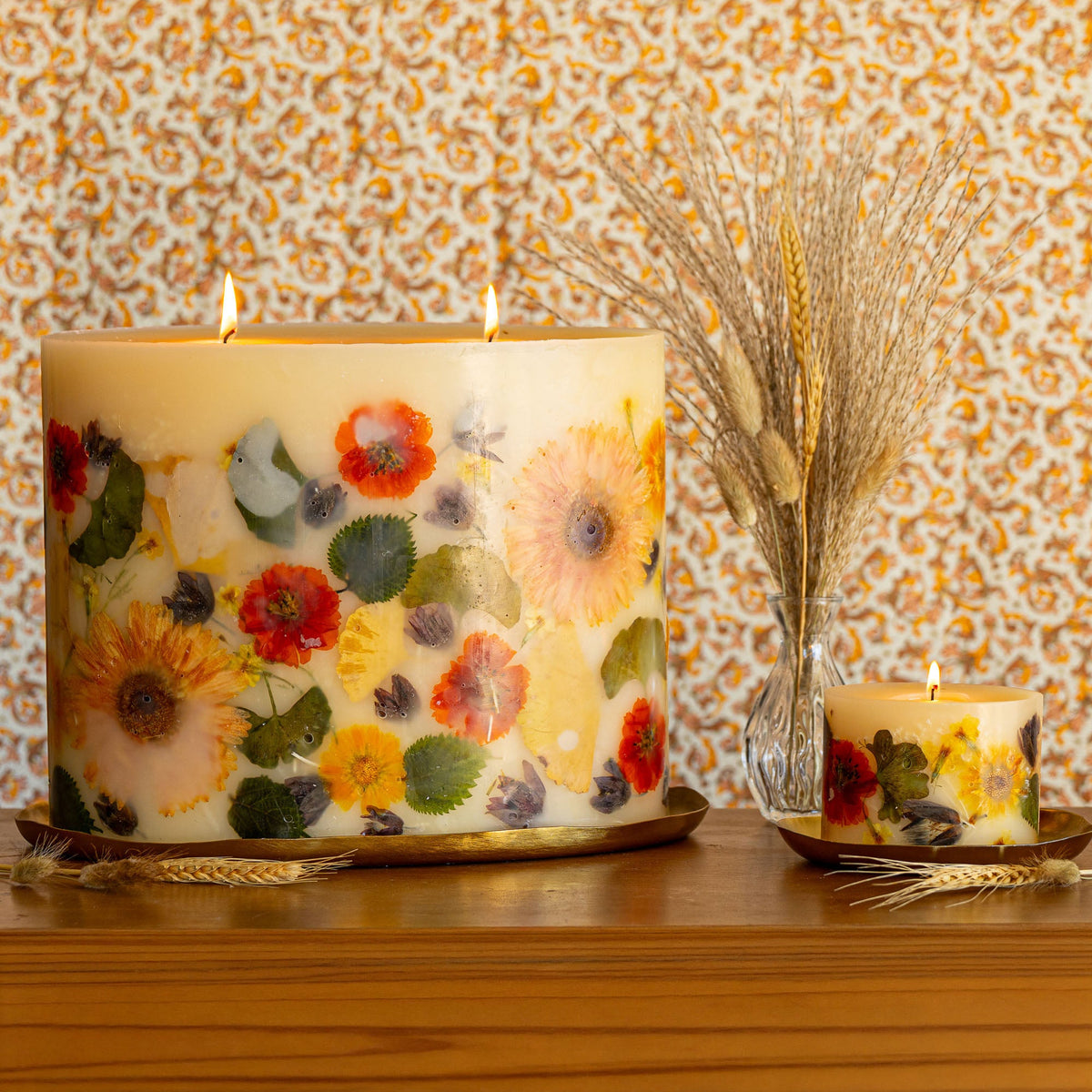 Petite botanical candle by Rosy Rings with harvest pumpkin scent, featuring a small decorative candle with autumn-inspired design.