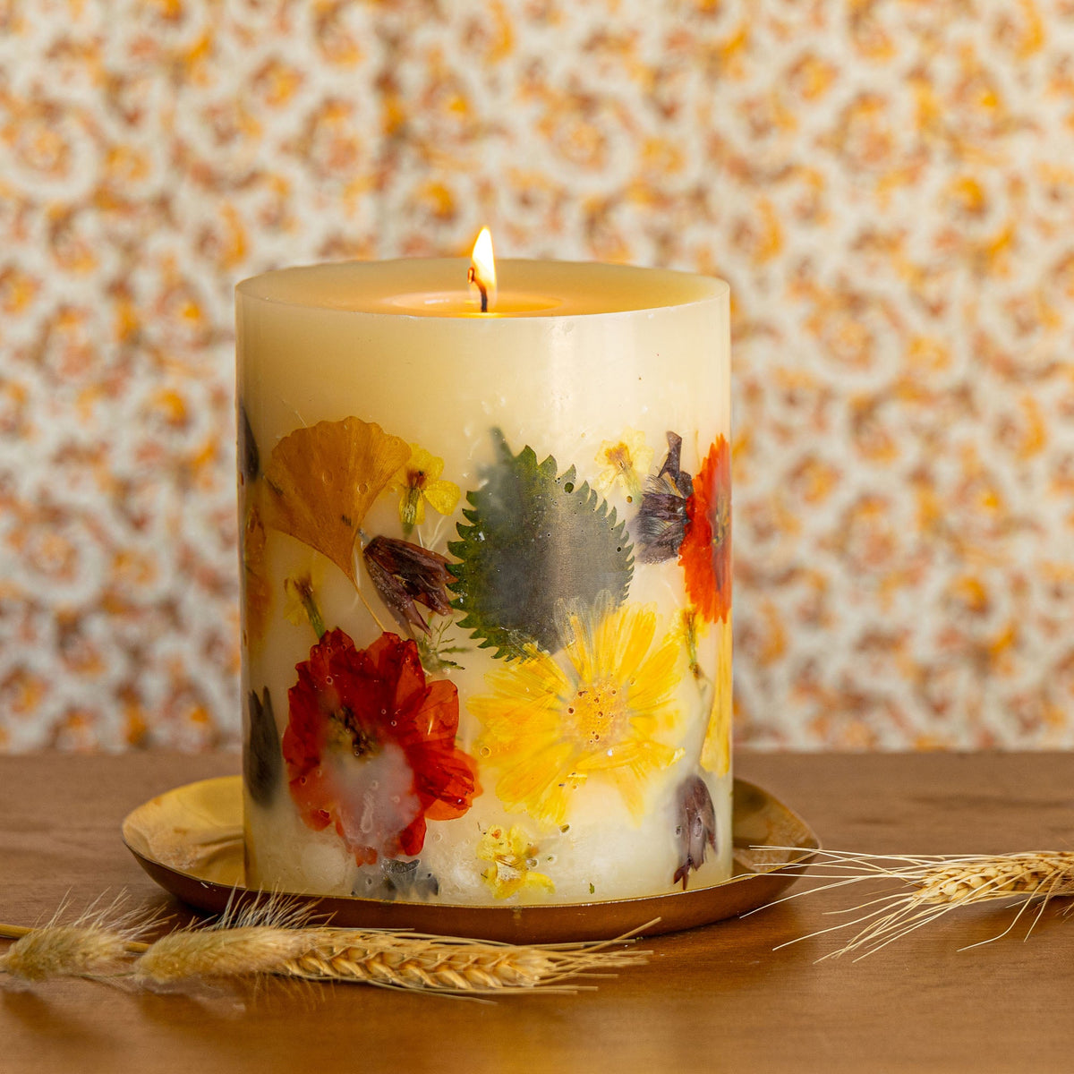 Small botanical candle by Rosy Rings featuring autumn harvest pumpkin scent and decorative botanical accents.