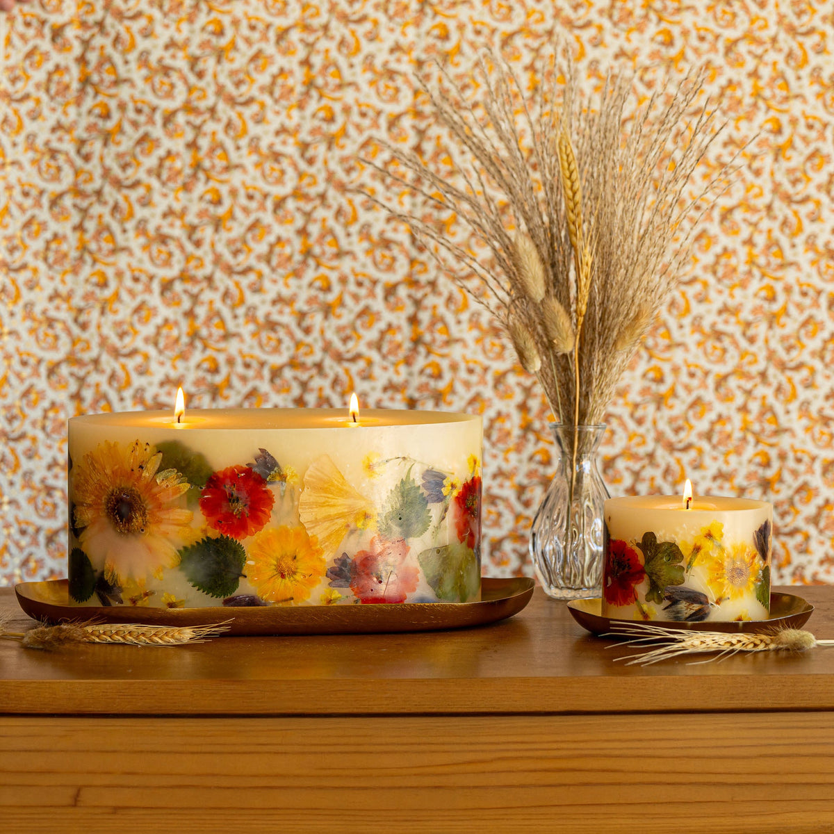 Petite Botanical Candle by Rosy Rings featuring a harvest pumpkin design, with warm autumn-colored botanical accents.