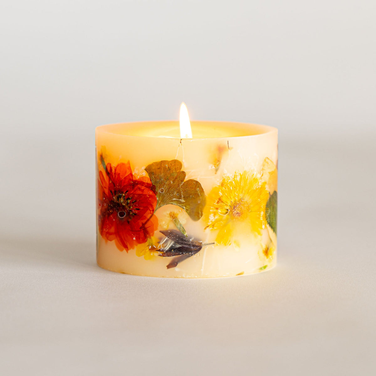 Petite botanical candle by Rosy Rings featuring harvest pumpkin scent with fall-inspired botanical accents.