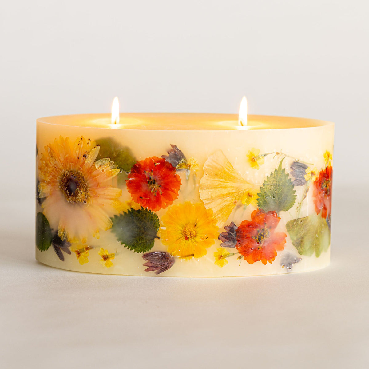 Brick Botanical Candle by Rosy Rings featuring a Harvest Pumpkin design with botanical accents, ideal for autumn decor.