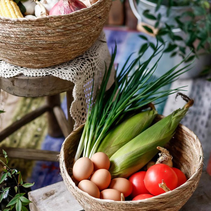 RusticReach seagrass bowl basket with woven texture and handles, perfect for storage or decorative use.