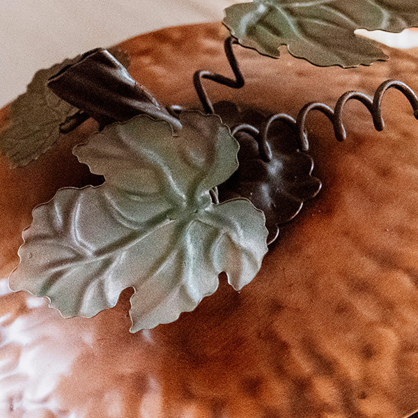 Decor Steals metal pumpkin with lid, crafted from metal, featuring a rustic design perfect for seasonal decor.