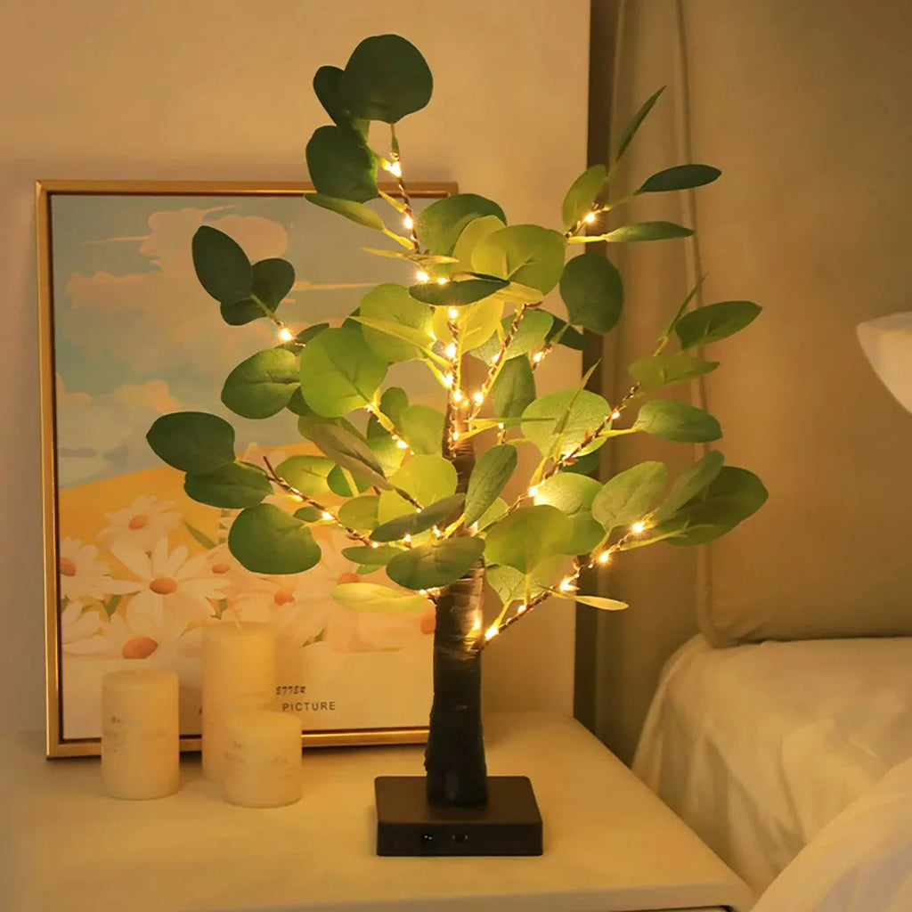 Perfecsy eucalyptus tree with lush green foliage and tall, slender trunk, ideal for indoor or outdoor decor.