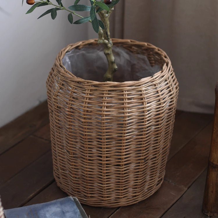 Natural wicker floor planter basket by RusticReach with a woven design, ideal for indoor or outdoor plant display.