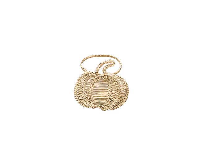 Handmade black woven pumpkin napkin ring from Payton James, perfect for Halloween table decor and fall party accents.