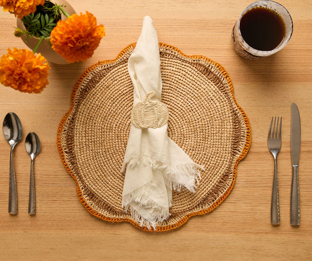 Black woven pumpkin napkin ring from Payton James, perfect for Halloween or fall table decor, adds a spooky boho touch.