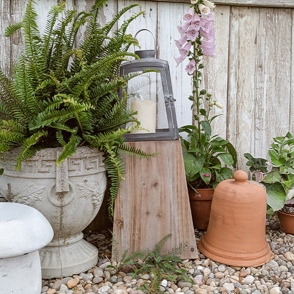 Set of two removable metal lanterns with wood bases, decorative home accents by Decor Steals, featuring a rustic design.