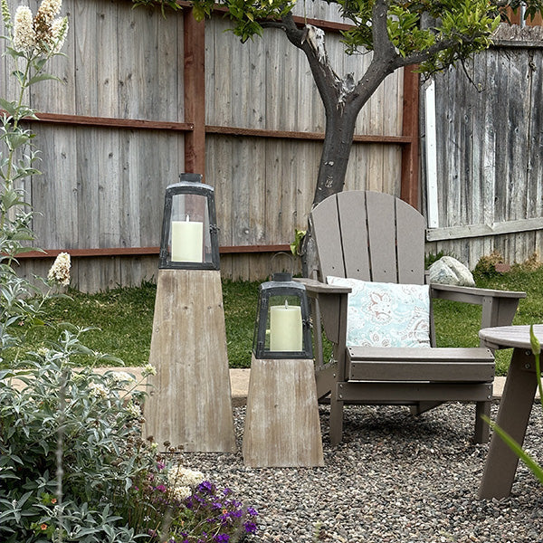 Set of two Decor Steals removable metal lanterns with wood bases, featuring glass panels and rustic design for home decor.