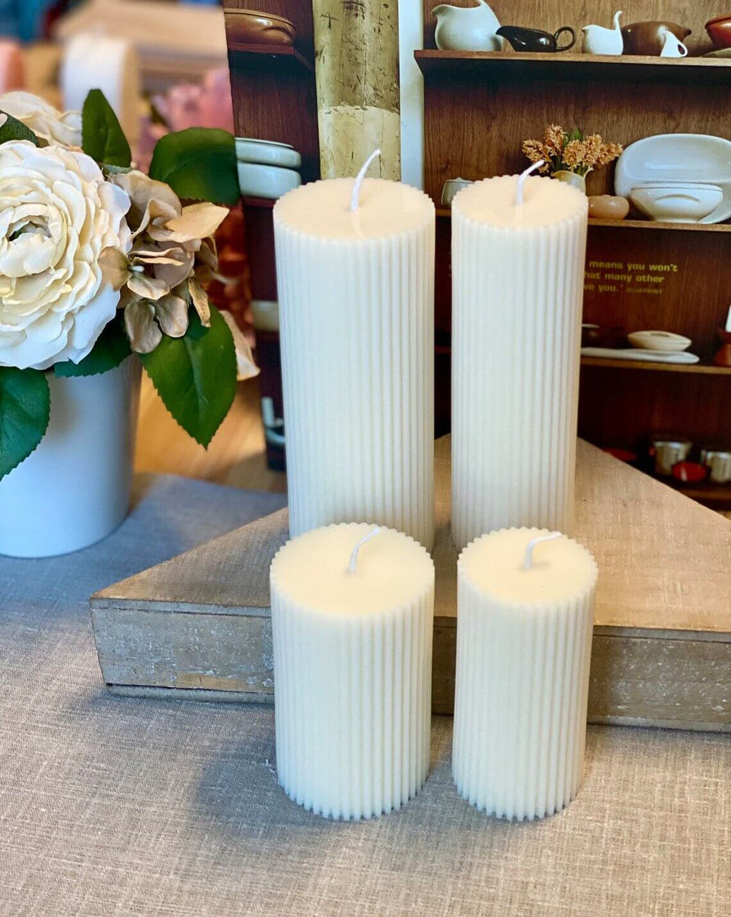 Minimalist ribbed pillar candle from Crazy About Candles, showcasing a sleek, textured design for cozy ambiance.