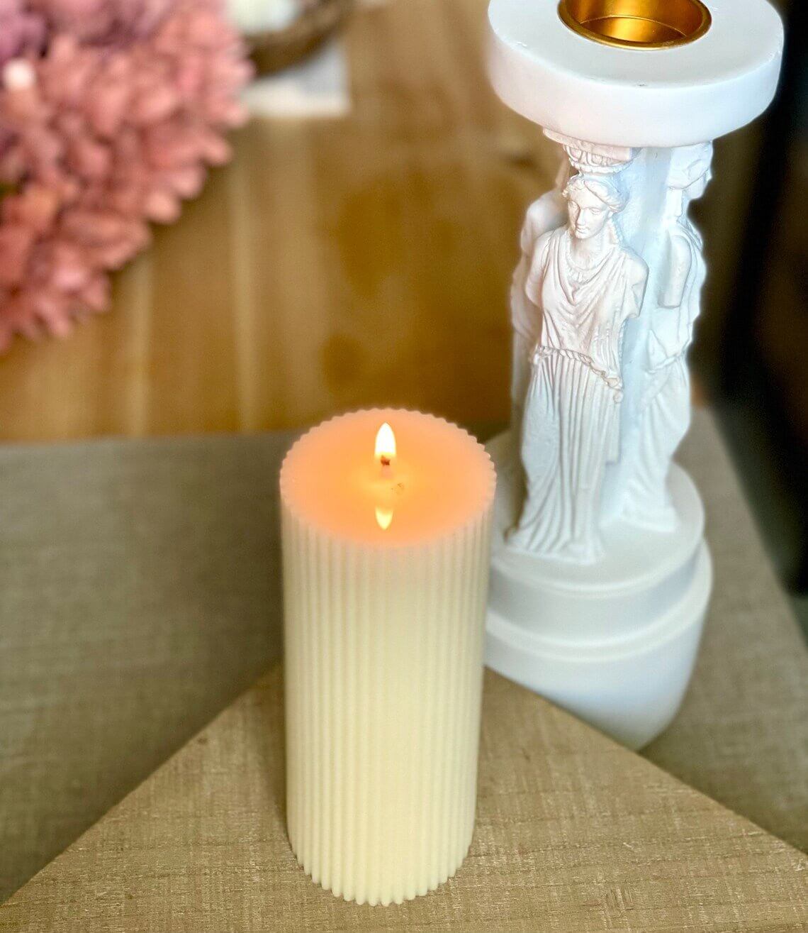 Minimalist ribbed pillar candle from Crazy About Candles, showcasing textured design and neutral color for cozy ambiance.