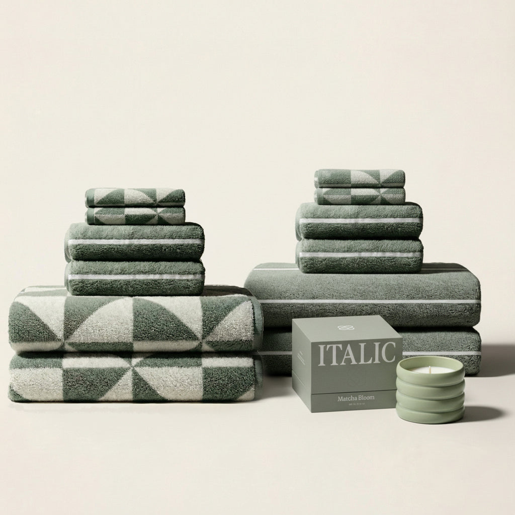 Set of plush Australian cotton bath towels from Italic, featuring soft, absorbent white towels with a textured weave design.