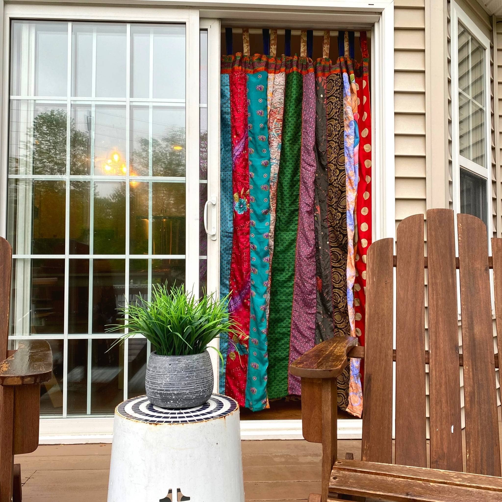 Colorful rainbow Oasis Drapes made from recycled sari fabric, eco-friendly home decor by Darn Good Yarn with boho crochet details.
