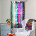 Rainbow Oasis Drapes by Darn Good Yarn, eco-friendly recycled sari curtains with boho crochet and knit details for home decor.