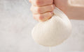 Reusable organic cotton cheesecloth for kitchen and dining, shown in a natural close-up image.