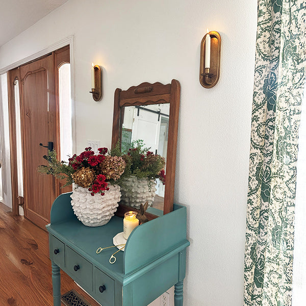 Pair of antique gold wall sconce candle holders with taper candle slots, decorative vintage-style wall sconces from Decor Steals.