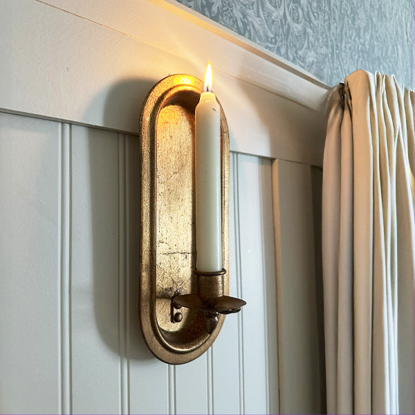 Set of two antique gold wall sconce candle holders with classic design, perfect for elegant home decor accents.